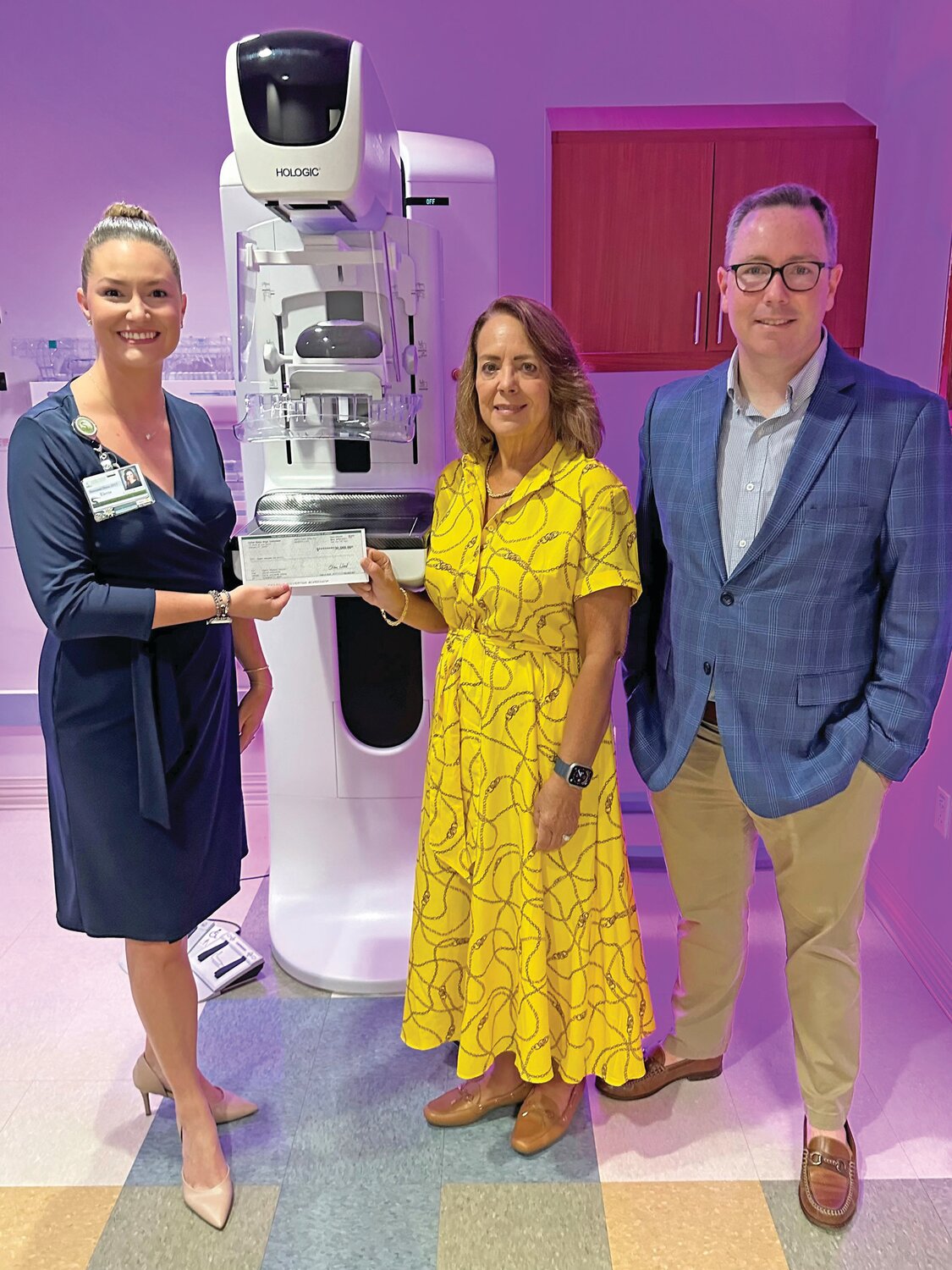 Elaine Wood, CFO U.S. Sugar and hospital authority board secretary/treasurer presents $30,000 check for new 3D Mammography machine to Electa Waddell, HRMC Foundation executive director, along with Ryan Duffy, HRMC Foundation board member and U.S. Sugar director of corporate communications